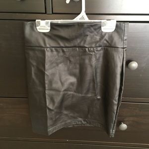 Mini leather skirt. Needisaymore.